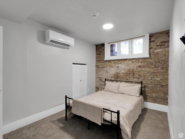 86 B St E Unit 10, Salt Lake City, UT 84103 - carpeted bedroom with a wall mounted AC and brick wall