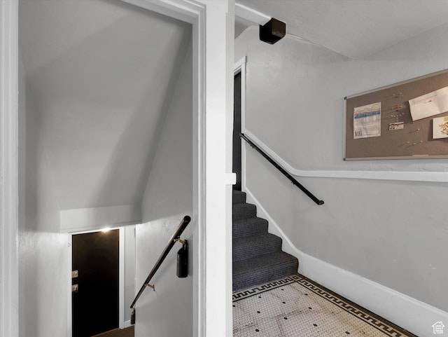 86 B St E Unit 10, Salt Lake City, UT 84103 - stairs featuring tile patterned flooring and lofted ceiling