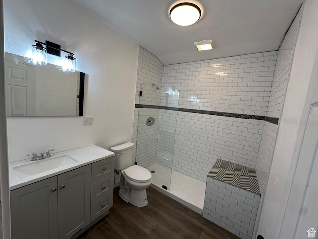 1254 N 800 W, Provo, UT 84604 - bathroom with hardwood / wood-style floors, toilet, vanity, and a tile shower