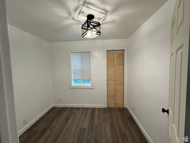 1254 N 800 W, Provo, UT 84604 - unfurnished room featuring a textured ceiling and dark hardwood / wood-style flooring