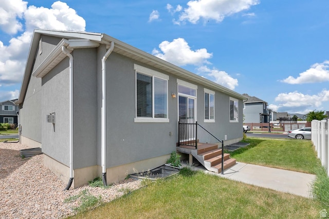 93 E 425 N, Vineyard, UT 84059 - view of front of property with a front yard and fence