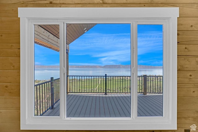 999 Cisco Run, Garden City, UT 84028 - doorway with a water view and wooden walls