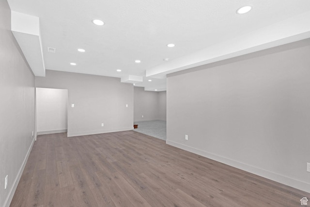 999 Cisco Run, Garden City, UT 84028 - below grade area with recessed lighting, wood finished floors, and baseboards