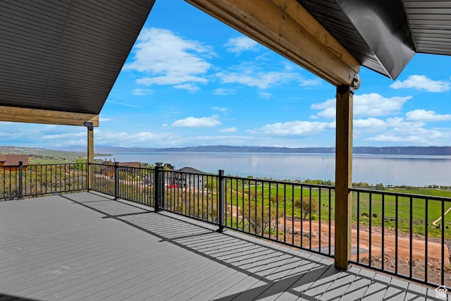 999 Cisco Run, Garden City, UT 84028 - wooden terrace with a water view