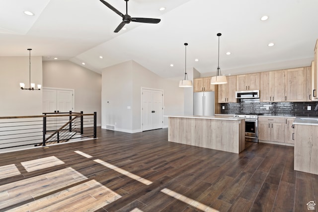4778 Paddleford Dr Unit 227, Eden, UT 84310 - kitchen featuring light brown cabinets, stainless steel appliances, a kitchen island, vaulted ceiling, and ceiling fan