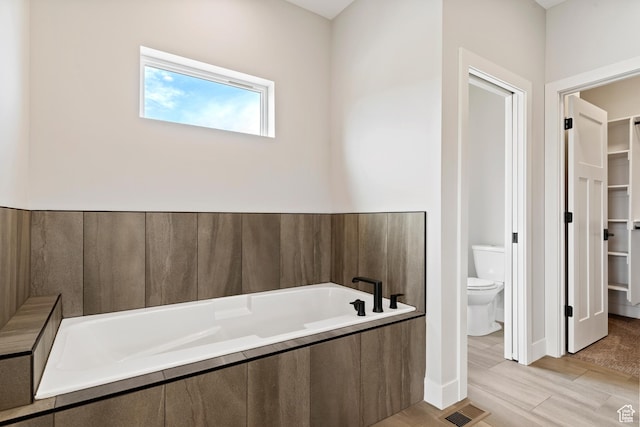 4778 Paddleford Dr Unit 227, Eden, UT 84310 - bathroom with toilet, a bath, and a spacious closet