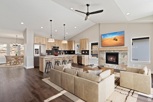 4778 Paddleford Dr Unit 227, Eden, UT 84310 - living area featuring plenty of natural light, dark wood-style flooring, a fireplace, a chandelier, and recessed lighting