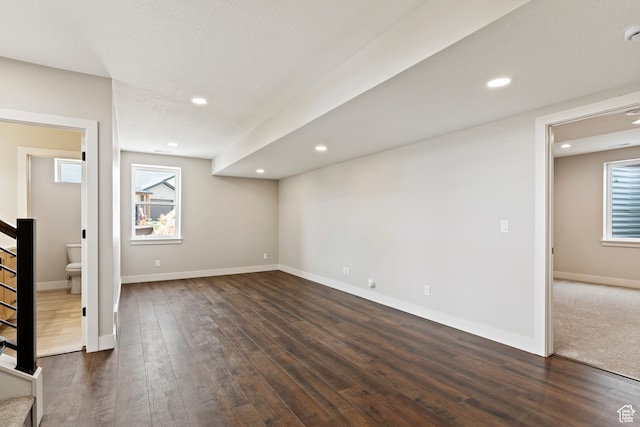 4778 Paddleford Dr Unit 227, Eden, UT 84310 - below grade area with stairway, dark wood-style flooring, plenty of natural light, baseboards, and recessed lighting