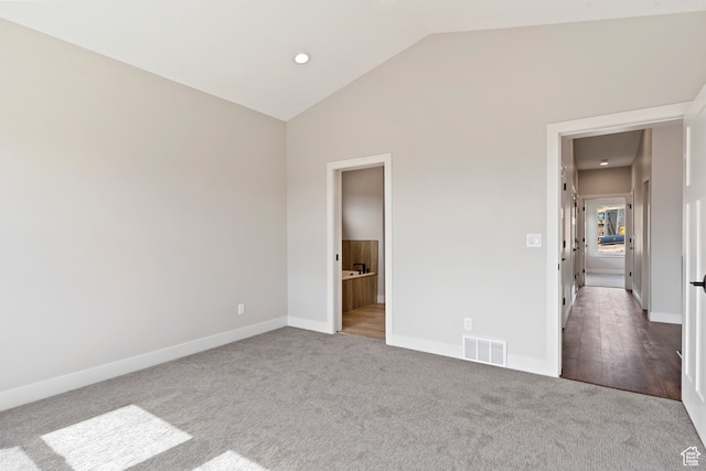 4778 Paddleford Dr Unit 227, Eden, UT 84310 - unfurnished bedroom featuring carpet, baseboards, lofted ceiling, ensuite bath, and recessed lighting
