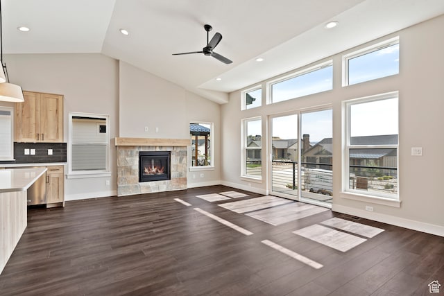 4778 Paddleford Dr Unit 227, Eden, UT 84310 - unfurnished living room with ceiling fan, high vaulted ceiling, a fireplace, dark wood-type flooring, and recessed lighting