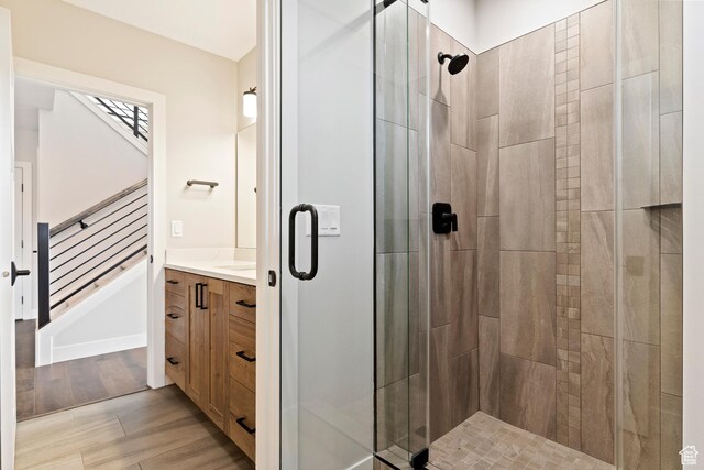 4778 Paddleford Dr Unit 227, Eden, UT 84310 - bathroom with a shower stall, vanity, and wood finished floors