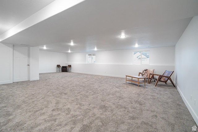 basement with carpet and baseboards