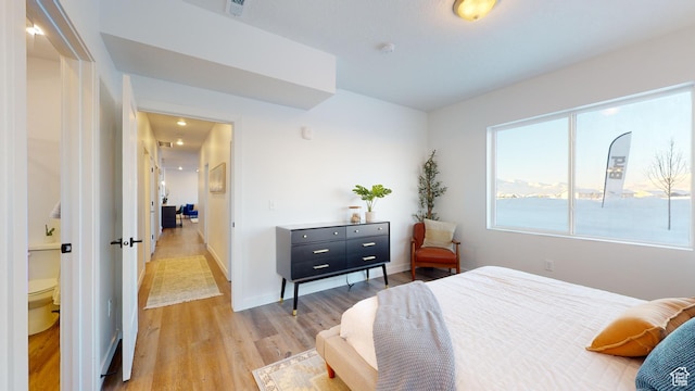 bedroom featuring hardwood / wood-style floors