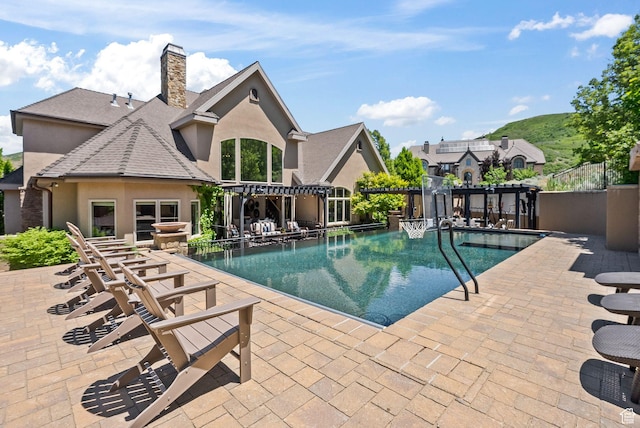 14234 S Canyon Vine Cv E, Draper, UT 84020 - view of swimming pool with a patio area