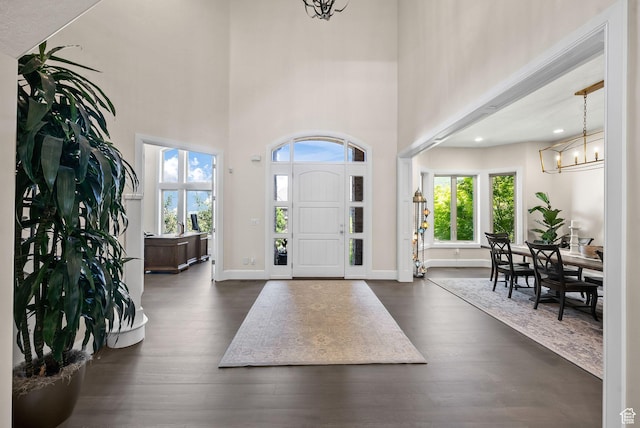 14234 S Canyon Vine Cv E, Draper, UT 84020 - entryway with a high ceiling, dark hardwood / wood-style flooring, and a notable chandelier