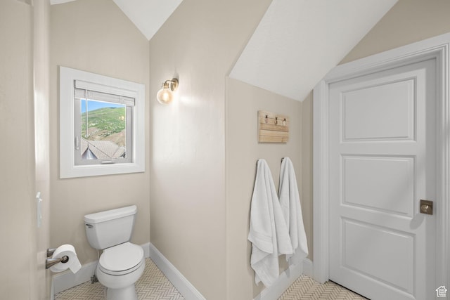 14234 S Canyon Vine Cv E, Draper, UT 84020 - bathroom featuring lofted ceiling and toilet