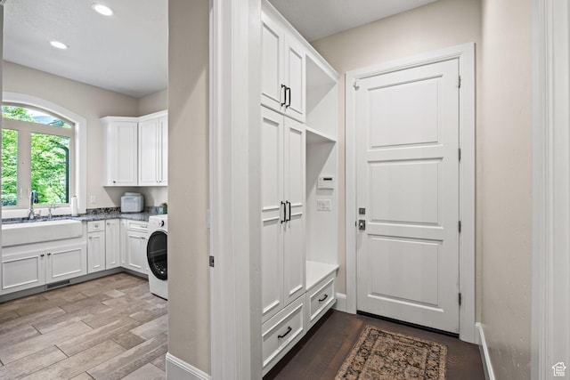 14234 S Canyon Vine Cv E, Draper, UT 84020 - mudroom featuring wood-type flooring, washer / clothes dryer, and sink
