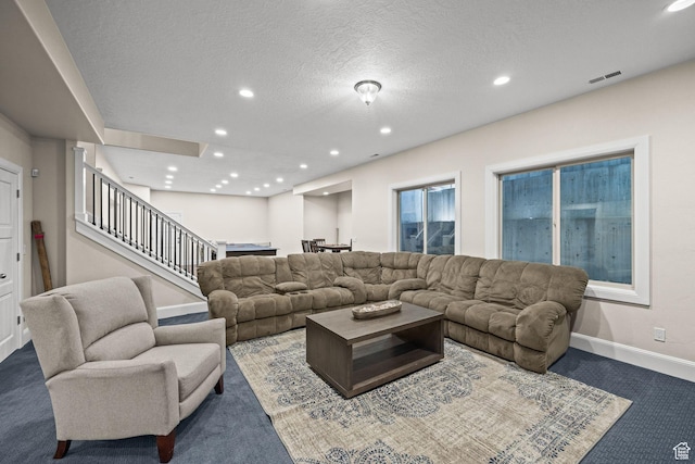 14234 S Canyon Vine Cv E, Draper, UT 84020 - carpeted living room with a textured ceiling