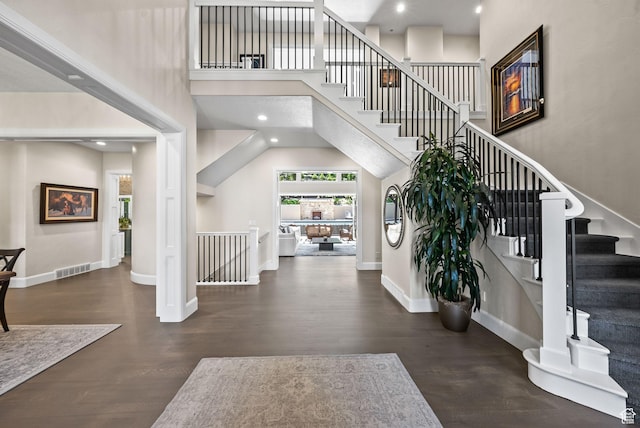 14234 S Canyon Vine Cv E, Draper, UT 84020 - entrance foyer with a towering ceiling and dark wood-type flooring