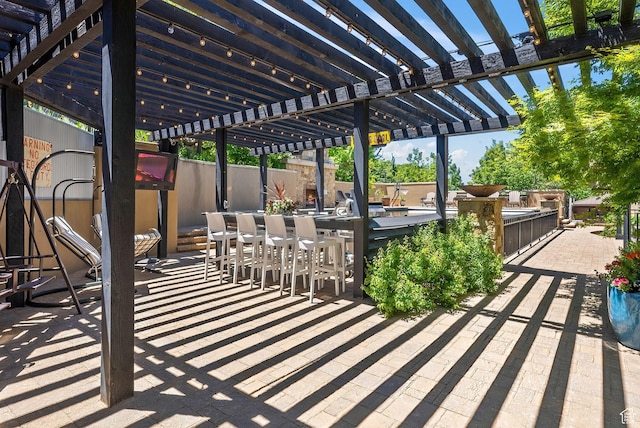 14234 S Canyon Vine Cv E, Draper, UT 84020 - view of patio / terrace featuring a bar and a pergola