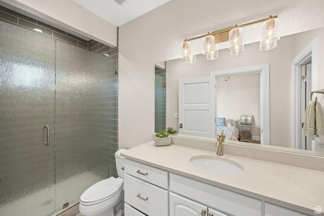 14234 S Canyon Vine Cv E, Draper, UT 84020 - bathroom featuring vanity, toilet, and walk in shower