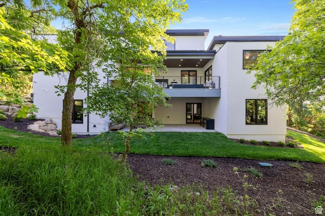 940 S N View Cir Unit 12, Woodland Hills, UT 84653 - back of property featuring a lawn, a patio area, and a balcony