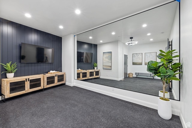 940 S N View Cir Unit 12, Woodland Hills, UT 84653 - living room featuring a notable chandelier and wood walls