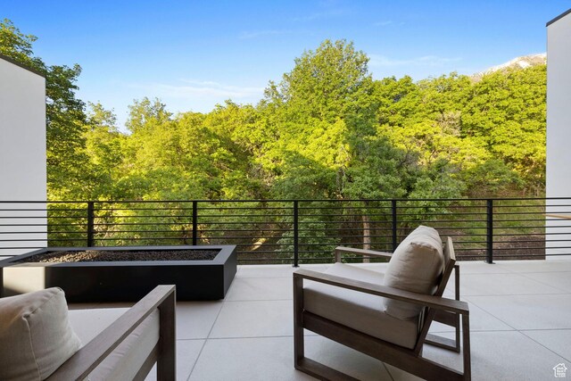 940 S N View Cir Unit 12, Woodland Hills, UT 84653 - view of patio with a balcony and an outdoor fire pit