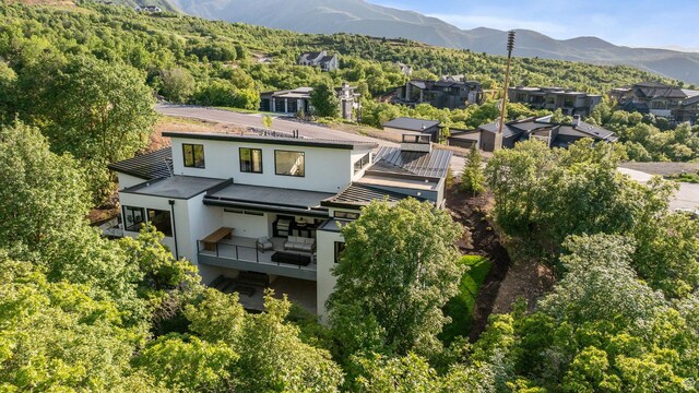 940 S N View Cir Unit 12, Woodland Hills, UT 84653 - back of house featuring a mountain view, stucco siding, and a forest view