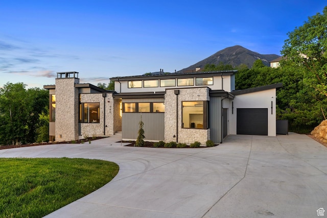 940 S N View Cir Unit 12, Woodland Hills, UT 84653 - view of front facade featuring a mountain view and a garage