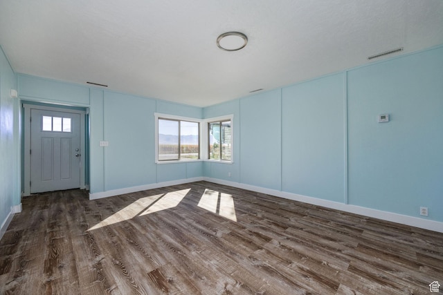 1090 S 2400 W, Lewiston, UT 84320 - entrance foyer with baseboards, visible vents, and wood finished floors