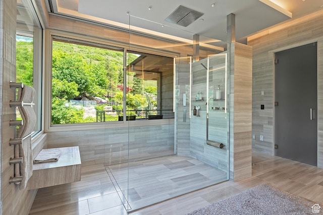 1559 E Tomahawk Dr N, Salt Lake City, UT 84103 - bathroom featuring plenty of natural light, tile patterned floors, and walk in shower