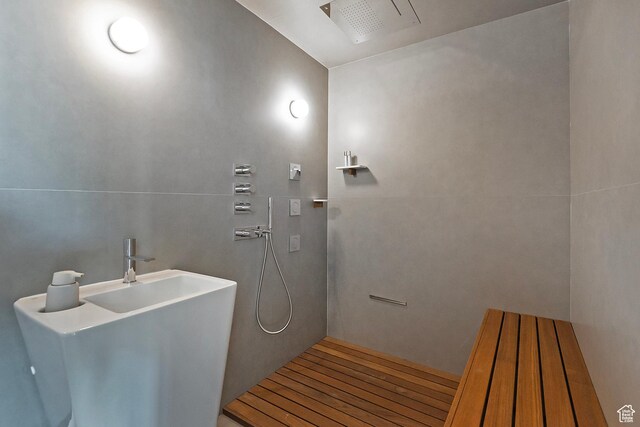 1559 E Tomahawk Dr N, Salt Lake City, UT 84103 - bathroom with tile walls, sink, and walk in shower