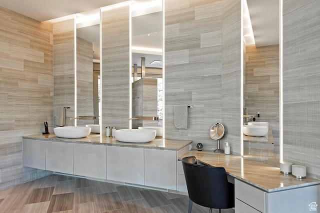 1559 E Tomahawk Dr N, Salt Lake City, UT 84103 - bathroom featuring tile walls and vanity