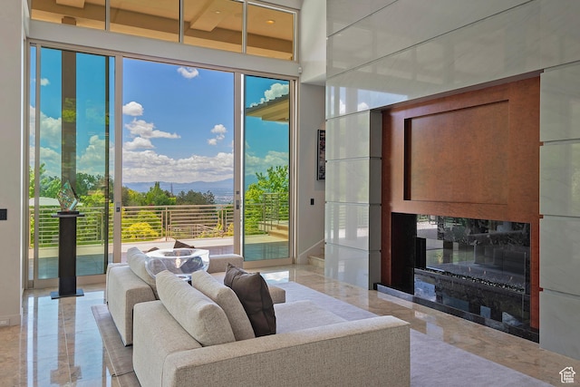 1559 E Tomahawk Dr N, Salt Lake City, UT 84103 - living room featuring a mountain view and a fireplace