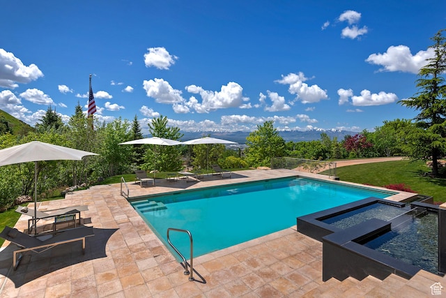 1559 E Tomahawk Dr N, Salt Lake City, UT 84103 - view of swimming pool with a patio and an in ground hot tub
