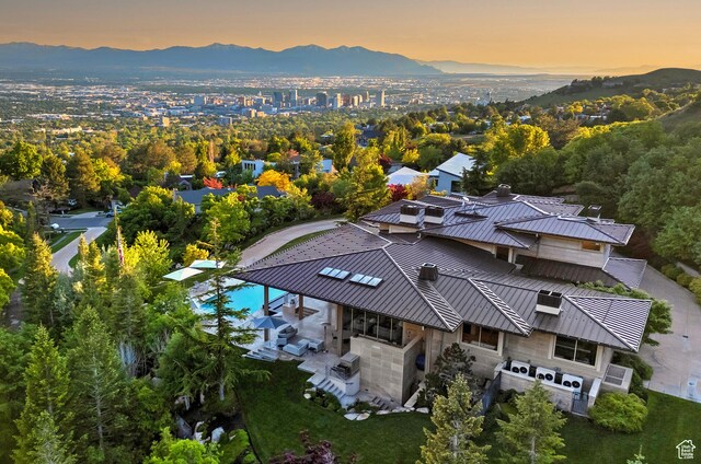 1559 E Tomahawk Dr N, Salt Lake City, UT 84103 - aerial view at dusk with a mountain view