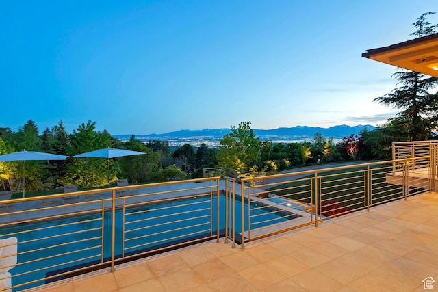 1559 E Tomahawk Dr N, Salt Lake City, UT 84103 - view of patio / terrace with a mountain view and a balcony