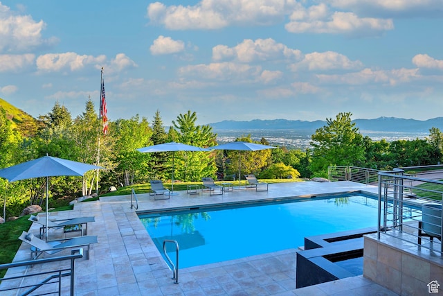 1559 E Tomahawk Dr N, Salt Lake City, UT 84103 - view of pool with a patio area and a mountain view