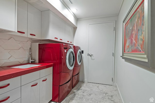 1559 E Tomahawk Dr N, Salt Lake City, UT 84103 - washroom featuring washing machine and clothes dryer, sink, and cabinets