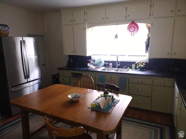157 W 500 S, Logan, UT 84321 - kitchen with sink, stainless steel refrigerator, and white cabinetry