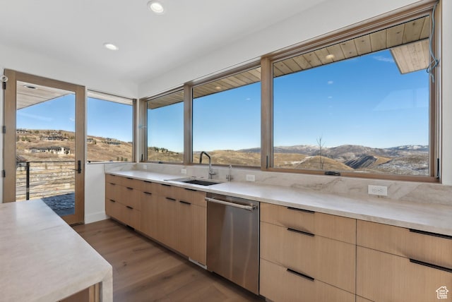 7702 N Fire Ring Glade, Park City, UT 84098 - kitchen featuring a mountain view, sink, light hardwood / wood-style flooring, stainless steel dishwasher, and light brown cabinetry