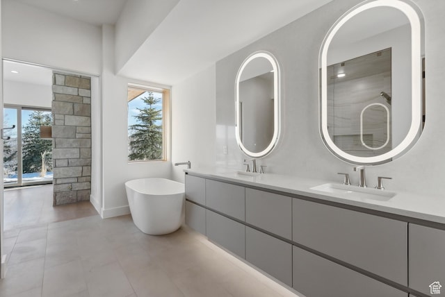 7702 N Fire Ring Glade, Park City, UT 84098 - bathroom with a washtub, vanity, and a healthy amount of sunlight