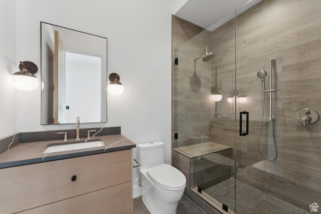 7702 N Fire Ring Glade, Park City, UT 84098 - bathroom with tile patterned floors, a shower with door, vanity, and toilet