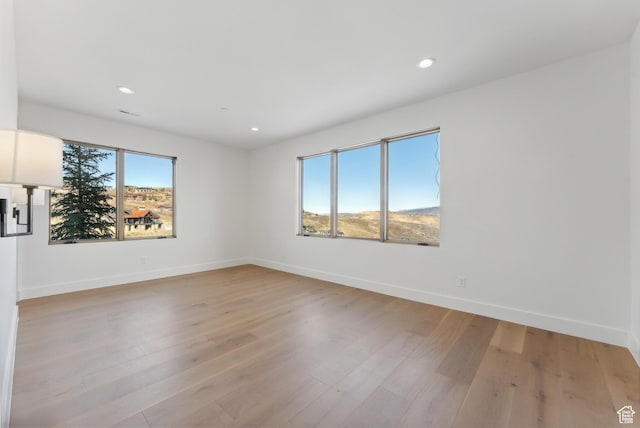 7702 N Fire Ring Glade, Park City, UT 84098 - empty room featuring light wood-type flooring