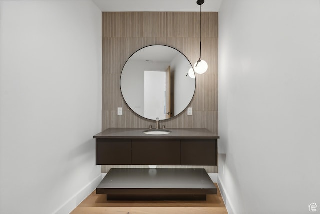 7702 N Fire Ring Glade, Park City, UT 84098 - bathroom with hardwood / wood-style floors and vanity
