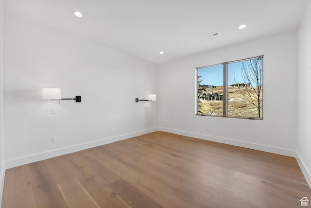 7702 N Fire Ring Glade, Park City, UT 84098 - unfurnished room with light wood-type flooring