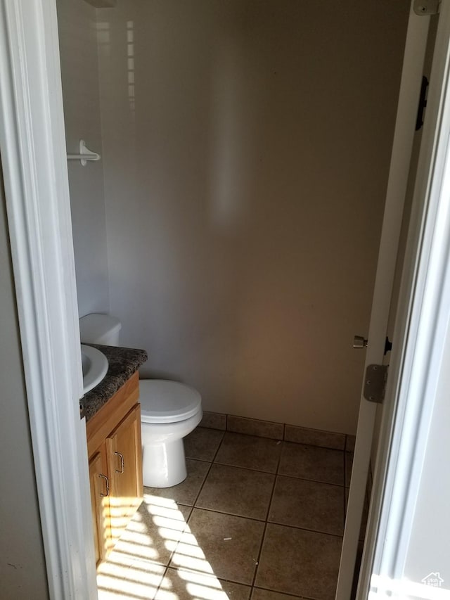818 S 50 E, Vernal, UT 84078 - bathroom featuring tile patterned flooring, vanity, and toilet