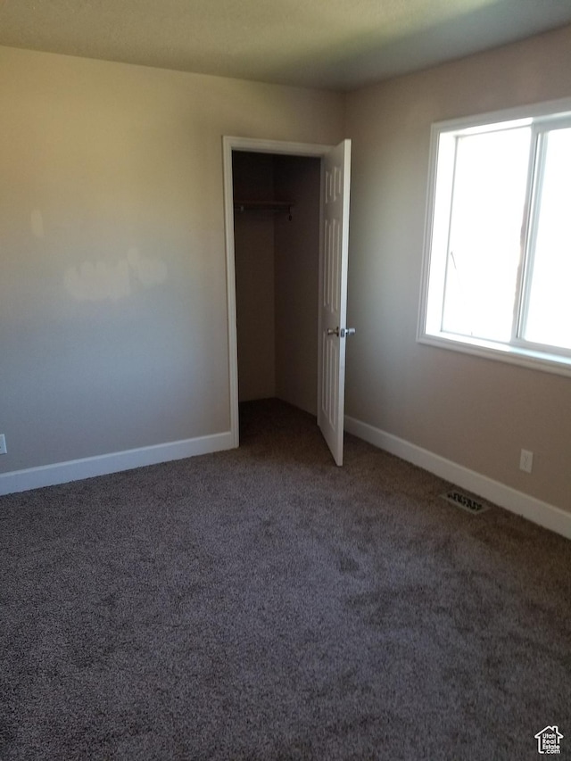818 S 50 E, Vernal, UT 84078 - unfurnished bedroom with carpet floors and a closet