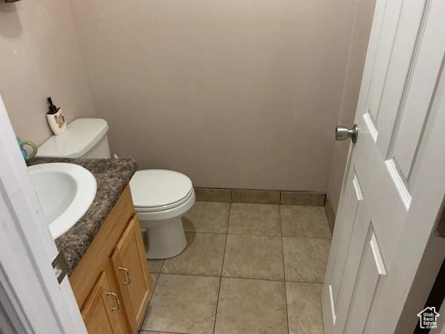 818 S 50 E, Vernal, UT 84078 - bathroom featuring tile patterned floors, vanity, and toilet